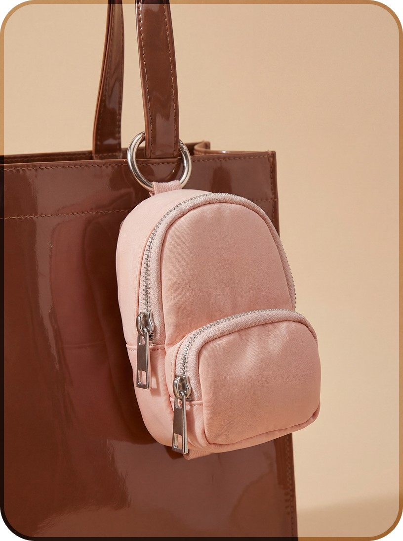 mini pouch keychains with soft pink color