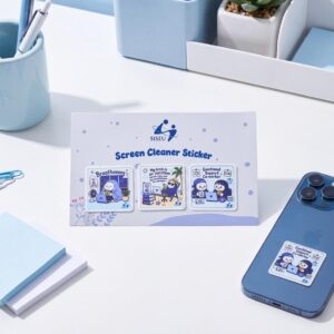 A customized screen cleaner sticker attached to the back of a blue smartphone next to its product display card on a clean office desk.