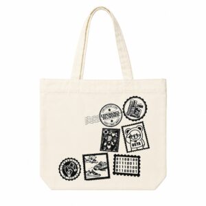 White nylon tote bag printed with black postal stamp and badge graphics BCCB18